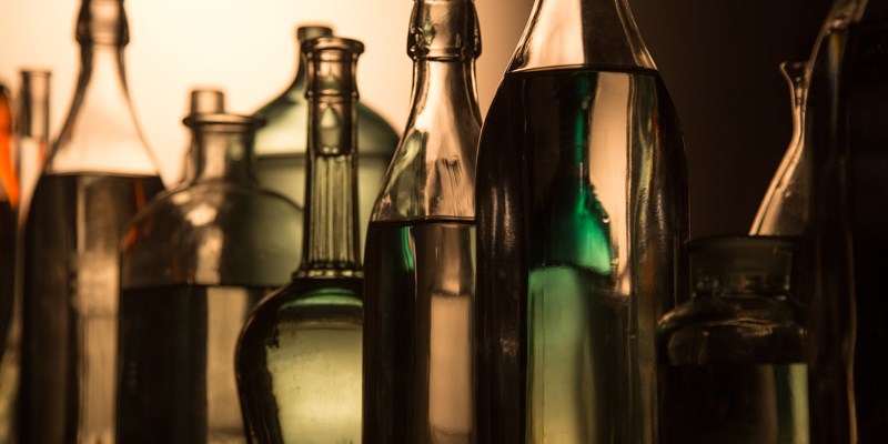 Still Life of Bottles in the homemade distillery cellar.